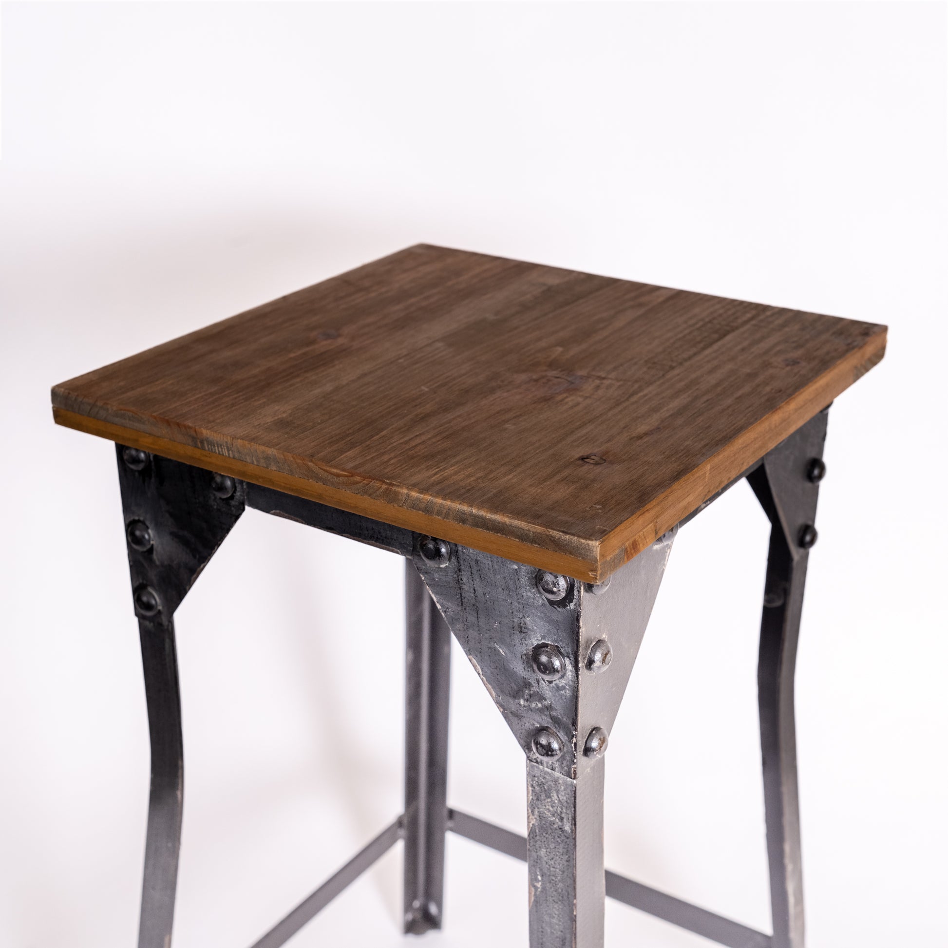 Antique stool with wooden seat